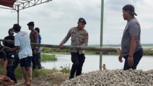 Brimob PMJ Mulai Bangun Jembatan Merah Putih Presisi, Perbaiki Akses Warga Pebayuran Bekasi